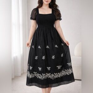 Chic Black Maxi Dress with White Floral Accents